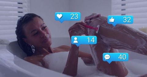 Adult woman practicing self-care while bathing and online interacting