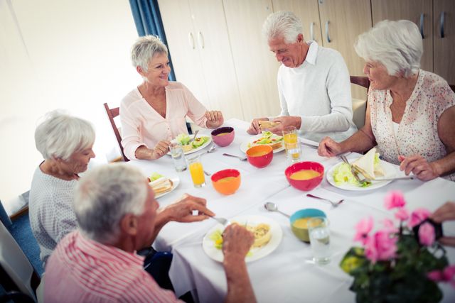 Pensioners at lunch in the retirement house
