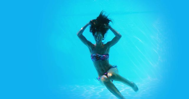 Underwater View of Woman Swimming in Bikini - Download Free Stock Images Pikwizard.com