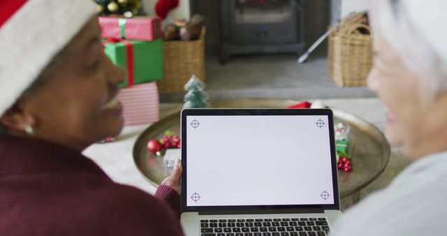 Couple Enjoying Christmas with Presents and Laptop Screen - Download Free Stock Images Pikwizard.com