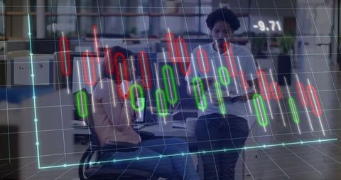Business Colleagues Reviewing Data with Financial Chart Overlay