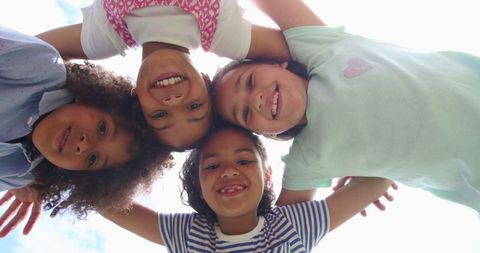 Happy Diverse Children in Circle Showing Friendship and Unity