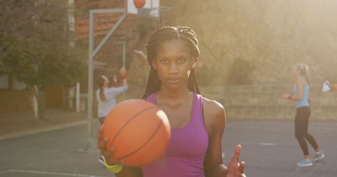 Portrait of Confident Female Basketball Player on Outdoor Court