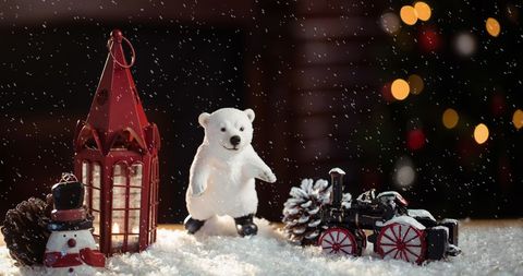 Festive Christmas Scene with Lantern and Bear Figurine - Download Free Stock Images Pikwizard.com