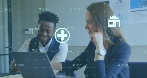 Diverse Colleagues Analyzing Data with Digital Technology