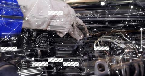 Technician using augmented reality diagnostic overlay repairing car engine wiring
