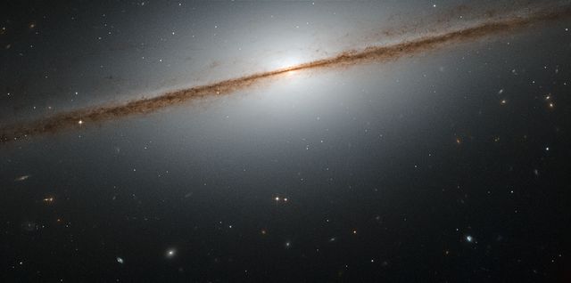 Edge-On View of NGC 7814 'Little Sombrero' Galaxy in Deep Space - Download Free Stock Photos Pikwizard.com