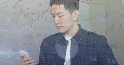 Business Man Analyzing Financial Data on Smartphone with Graph Overlay