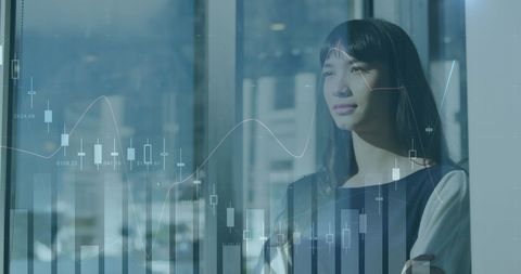 Businesswoman Analyzing Digital Data in Office