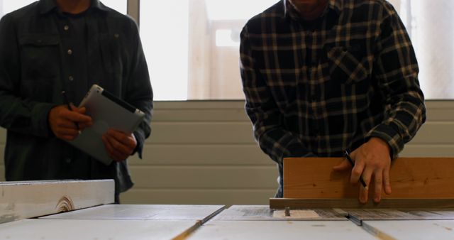 Industrial Workers Measuring and Inspecting Wood Panels - Download Free Stock Images Pikwizard.com