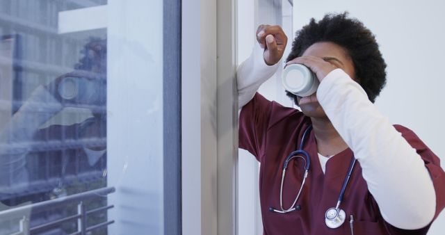 Tired Nurse Taking a Break and Drinking Coffee - Download Free Stock Images Pikwizard.com