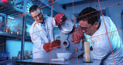 Diverse Scientists Engaged in Innovative Laboratory Experiment - Download Free Stock Images Pikwizard.com