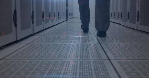 Walking Through Modern Data Center Corridor
