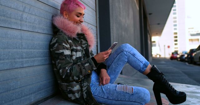 Trendy Young Woman with Pink Hair Using Smartphone Outdoors - Download Free Stock Images Pikwizard.com