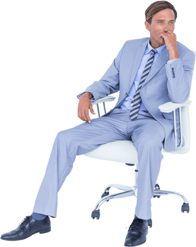 Businessman in Light Suit Sitting on Office Chair Looking Pensive