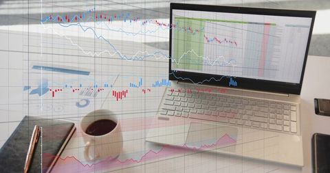 Laptop trading workspace with spreadsheets, candlestick charts and market analytics overlay