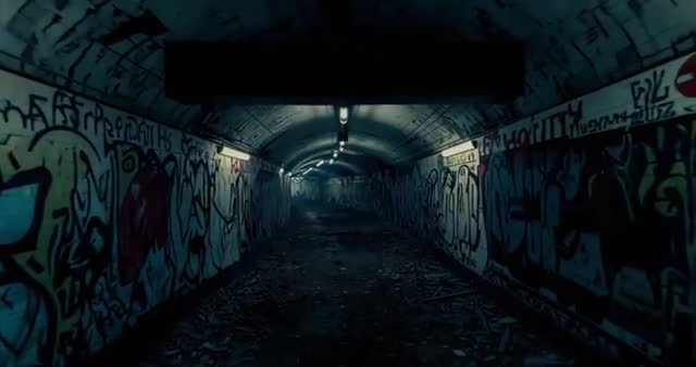Moody Exploration Through Graffitied Underground Passage