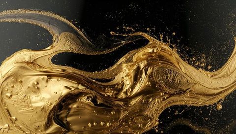 Liquid Gold Swirl Flowing Metallic Splash with Suspended Droplets on Black Background