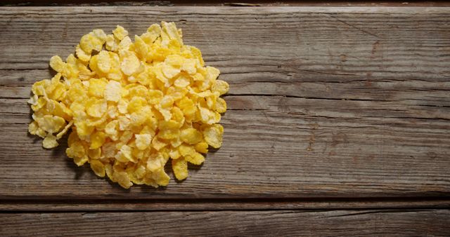 Heap of Crunchy Cornflakes on Rustic Wooden Table - Download Free Stock Images Pikwizard.com