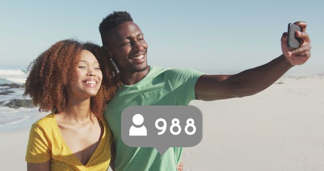 Profile icons with increasing numbers against african american couple taking a selfie on the beach. social media networking and vacation concept