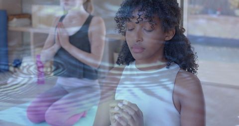 Diverse Teen Girls Meditating with Water Ripples Overlay