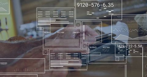 Senior professional typing on laptop in cafe with data dashboard overlays and analytics