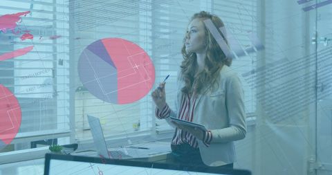 Woman Analyzing Business Data in Modern Office