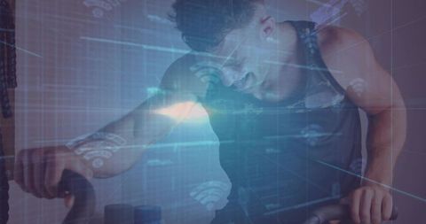 Man on Stationary Bike with Futuristic Fitness Technology Overlays