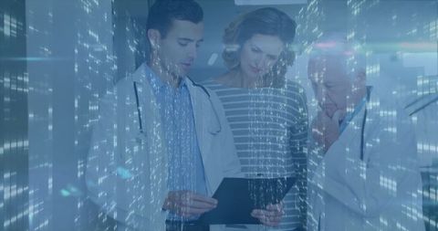 Medical Team Consults with Digital Data Overlay in Hospital Setting