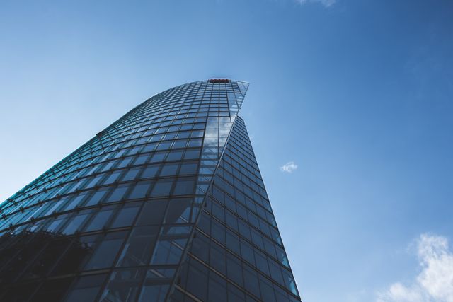 Modern Glass Skyscraper against Blue Sky - Download Free Stock Photos Pikwizard.com