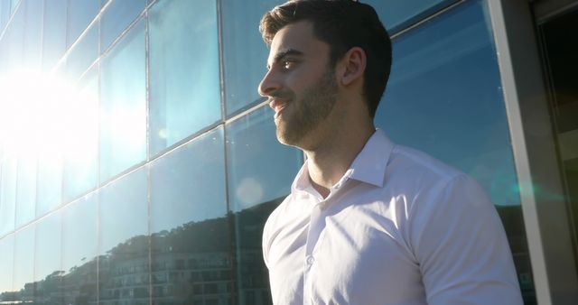 Confident Businessman Standing Outside Modern Building - Download Free Stock Images Pikwizard.com