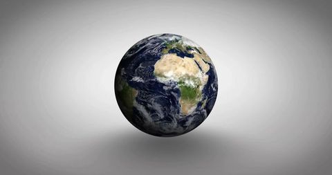 Floating Earth Globe on Grey Background with Drifting Clouds - Download Free Stock Images Pikwizard.com