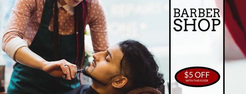 Barber Expertly Trimming Beard in Professional Grooming Salon