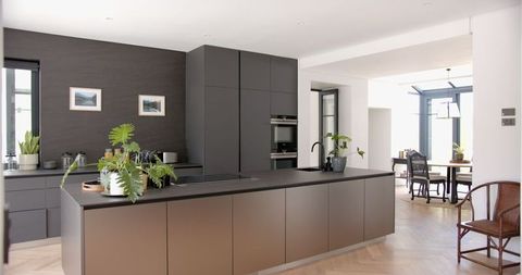 Modern Kitchen Interior with Sleek Dark Cabinets and Island - Download Free Stock Images Pikwizard.com