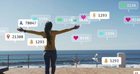 Woman Embracing Social Media Notifications on Sunny Seaside Promenade, Arms Outstretched