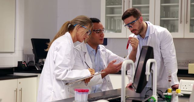 Team of Scientists Collaborating in Modern Lab - Download Free Stock Images Pikwizard.com