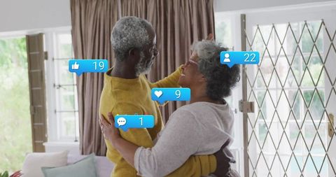Senior couple embracing with social media reactions