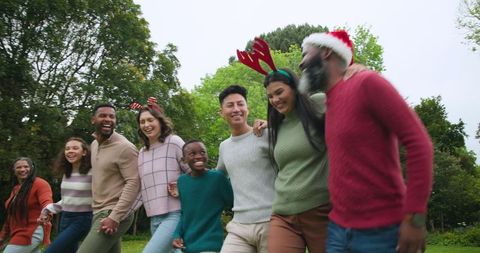 Diverse Family Celebrating Outdoors in Festive Attire