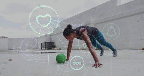 Technologically enhanced fitness routine with digital interface icons