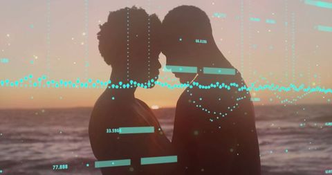 Silhouetted Couple Embracing at Sunset with Digital Overlay