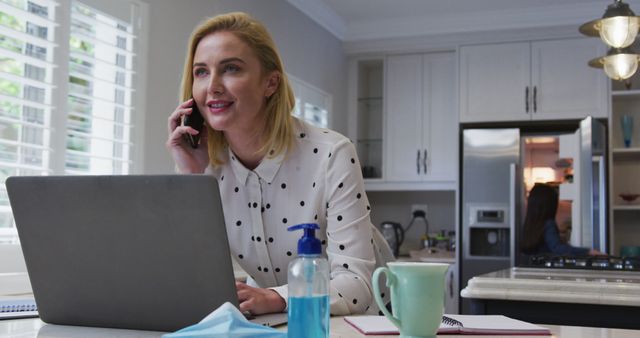 Blonde Businesswoman Working from Home Office While on Phone Call - Download Free Stock Images Pikwizard.com