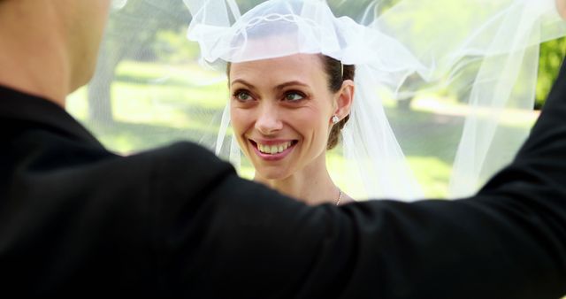 Groom Lifting Bride's Veil Outdoors Wedding Ceremony - Download Free Stock Images Pikwizard.com