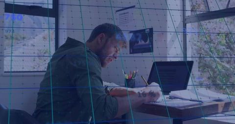 Focused writer at work with augmented reality display overlay