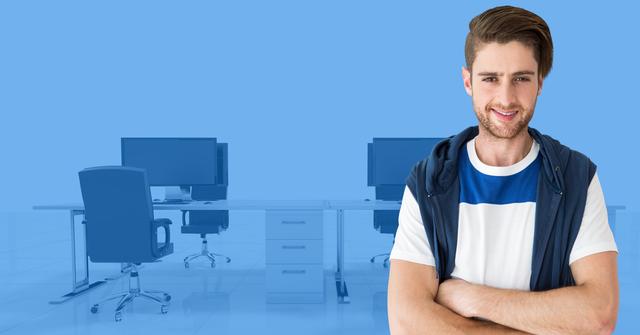 Confident young man standing with arms crossed in modern office. Ideal for business websites, corporate presentations, or advertisements for professional services.