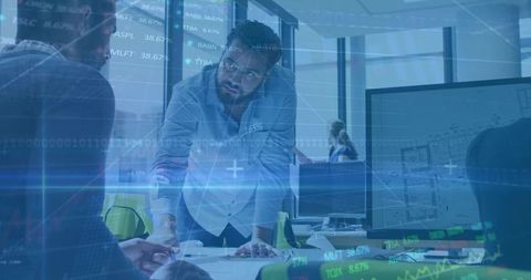 Project Lead Discussing Plans with Team in Modern Office