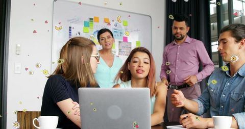 Team Collaborating on Innovative Business Strategy in Tech Office