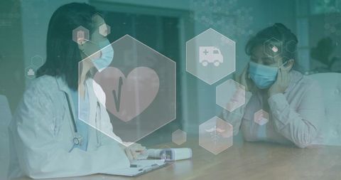 Doctor consulting masked patient at clinic table with telehealth icons and stethoscope