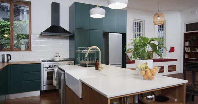 Modern Kitchen with White Countertops and Green Cabinets - Download Free Stock Images Pikwizard.com