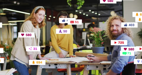 Team Collaborating in Modern Office with Social Media Icons Overlay