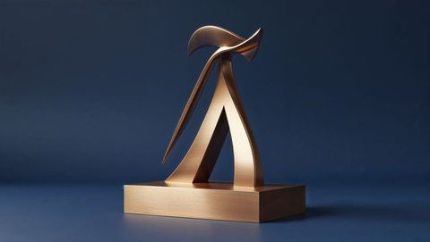 Contemporary abstract bronze-gold sculpture on base
